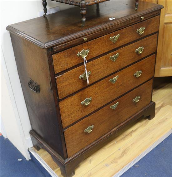 An 18th century oak chest with slide, W.87cm